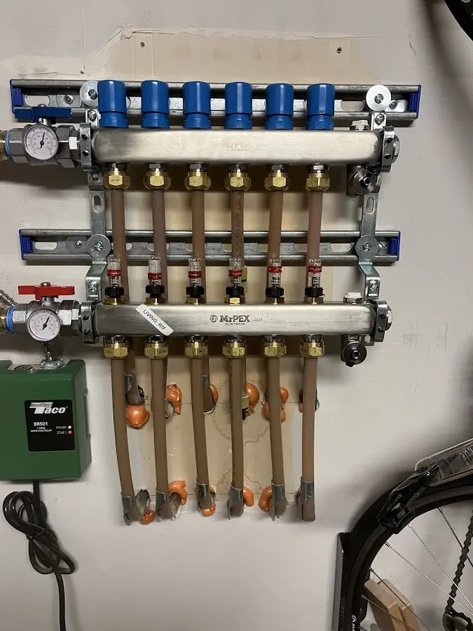 Plumber performing Water Heater Repair at a residential property in Lake Barcroft